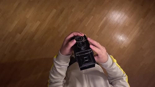 Pov First Person View Photographer Holding Vintage Twin Lens Reflex Camera