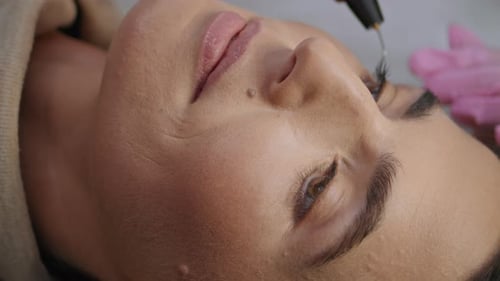 Innovative Procedure Removing Wrinkles in Cosmetology Clinic Vertical Close Up