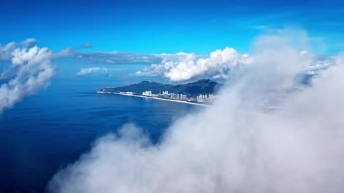Aerial Top view of a transparent blue sea with beautiful waves at sunny day in summer. air of ocean