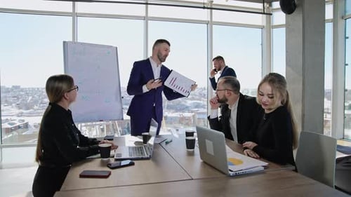Confident Presentation by Business Team in Bright Office