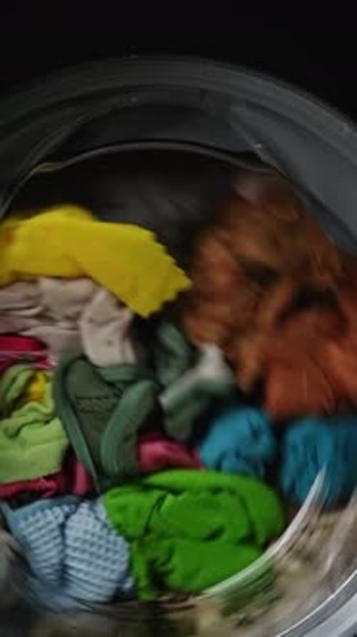 Washing Machine Spinning Colorful Clothes