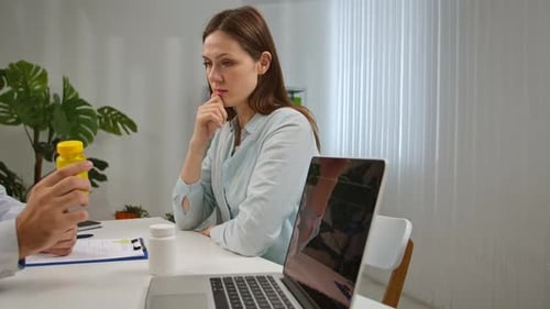 Doctor and Patient Consultation in Modern Medical Office