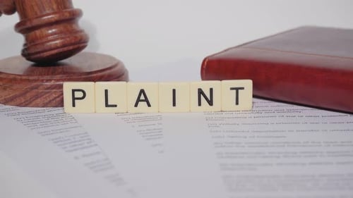 Gavel With Law Book And Legal Document