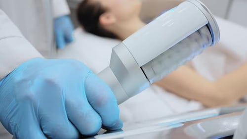 Medical Treatment on Patient in Examination Room