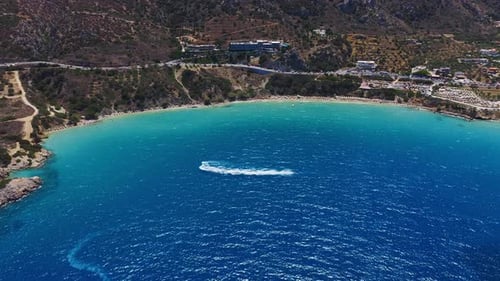 Aerial View of Voulisma Beach with Boats and Turquoise Waters