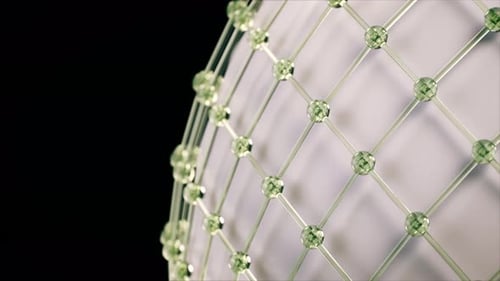 Seamless loop of rotating glass sphere with geometric lattice structure abstract background