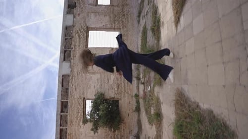 VERTICAL acrobatic dance performing in abandoned building, sexy female dancer woman dancing alone in