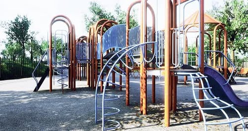 Colorful Playground with Unique Climbing Structures and Slides