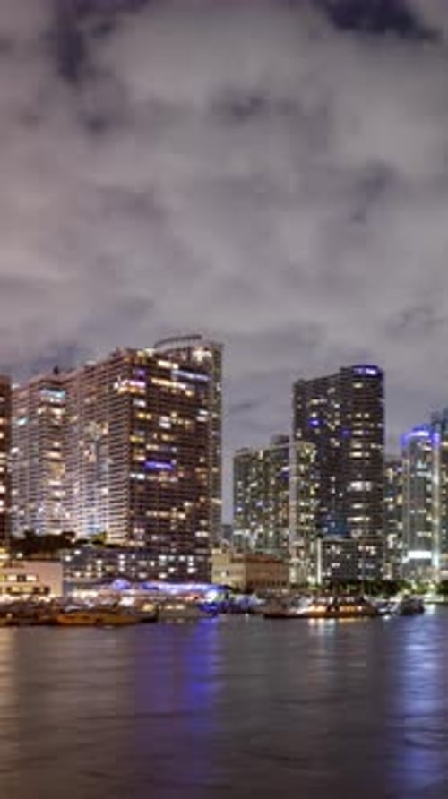Vertical Night time lapse of the skyline of Miami Florida