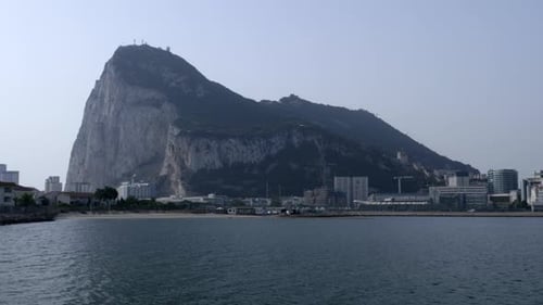 Gibraltar at sunset, with its airstrip and part of the skyline, as seen from La Linea de la