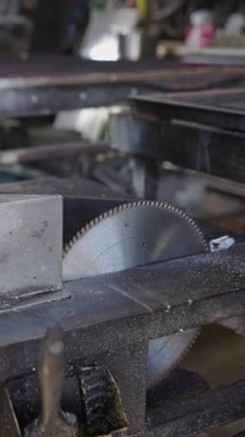 Close Up Shot of an Angle Grinder in a Metal Factory in Koh Tao Thailand FHD Vertical Video