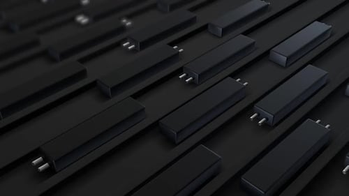 Minimalist black rectangular objects on dark surface