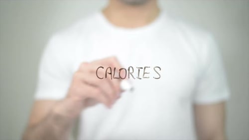 Calories, Man Writing on Transparent Screen