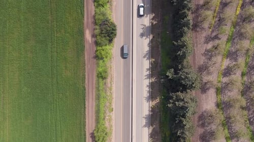 Countryside highway road with traffic heading on both directions