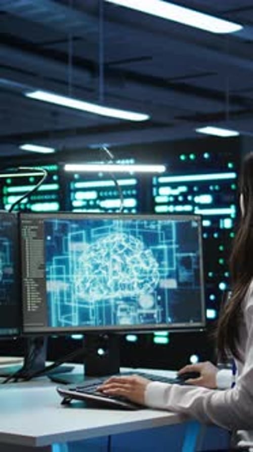 Vertical Video Technicians Coworkers Using AI Tech on Computer to Do Data Center Checkup