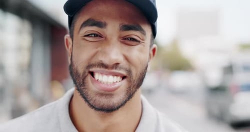 Laughing, face and a man or courier in the city for logistics, ecommerce delivery