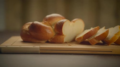 Braided Bread Loaf Sliced on Cutting Board