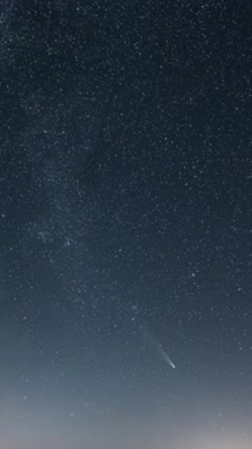 Milky Way Galaxy and Comet Tsuchinshan Atlas in Starry Night Sky