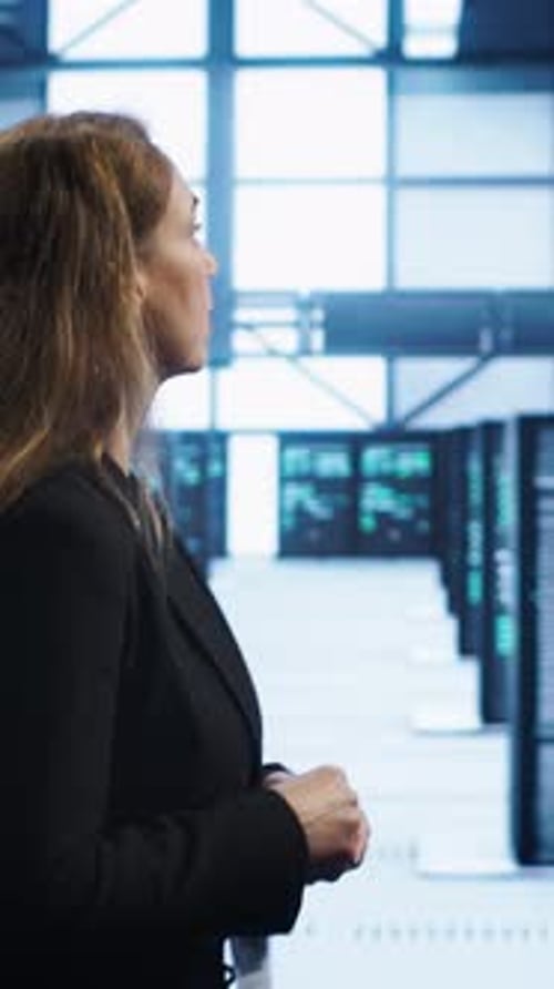 Vertical Video IT Professional Supervising Data Center Workplace Checking Hardware