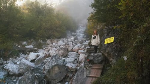 Beautiful Female Traveler Walks Through the Forest to the Mountains Incredibly Beautiful Views in
