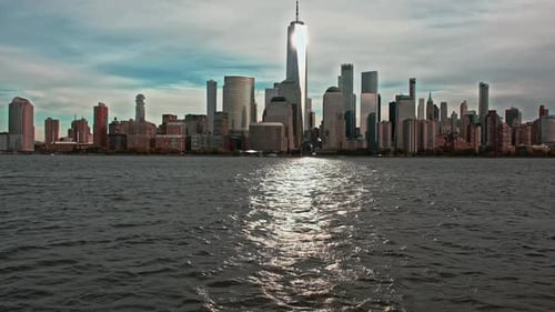 New York Skyline Shines in Daylight New York Cityscape Reflects on River New York Towers Define
