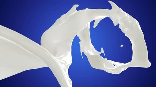 Liquid Milk Flowing And Splashing