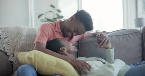 Affectionate Couple Relaxing Together on Couch