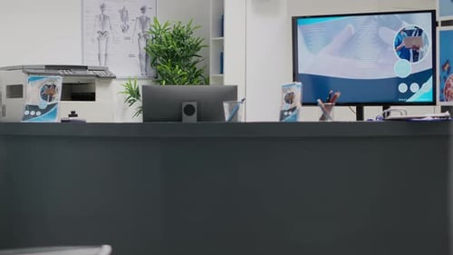 Empty Hospital Reception Desk in Waiting Area Lobby