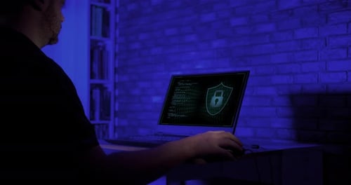 Young Man Running A Cyber Security Software