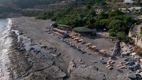 Aerial View Group of People Paddleboarding in a Lagoon on a Sunny Summer Day