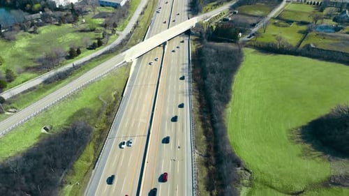 Aerial View of Busy Highway During Daytime Rush Hour Traffic