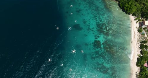 Beach and Ocean Waves on Coastline of Samal Island Davao Philippines