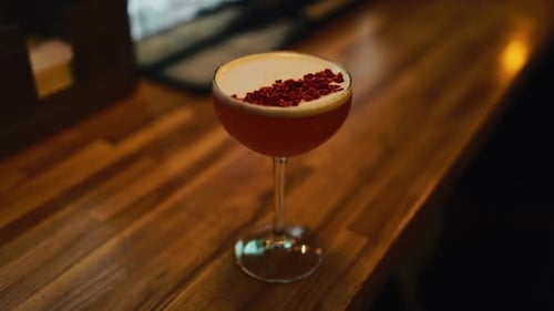 Elegant Cocktail Garnished in Bar Setting