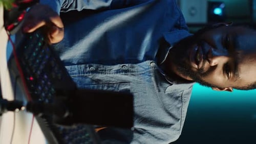 Young Adult Man Talking to Camera at Night