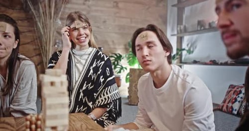 Friends Enjoying Game Night at Home