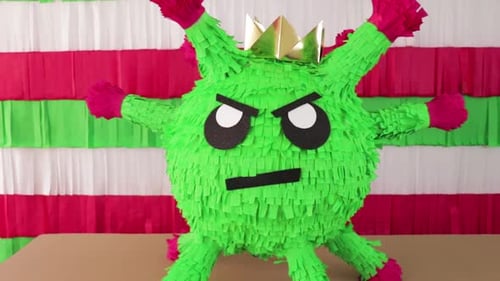 Coronavirus piñata. Mexican Crafts. Covid pandemic. Panning.
