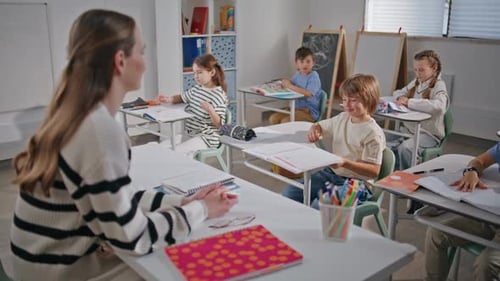Group Pupils Learning School Classroom Closeup Classmates Sitting Desks Smiling
