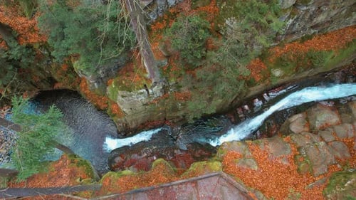 Aerial Over Mountain Waterfall