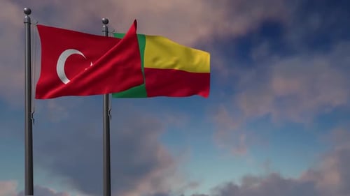 Waving Flags of Turkey and Benin Against a Cloudy Sky