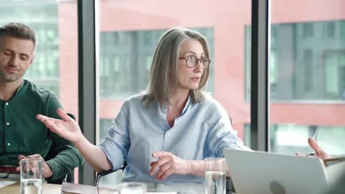 Business Meeting with People in Modern Office