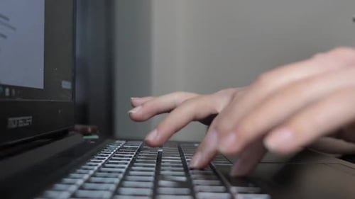 Typing with Keyboard of Laptop