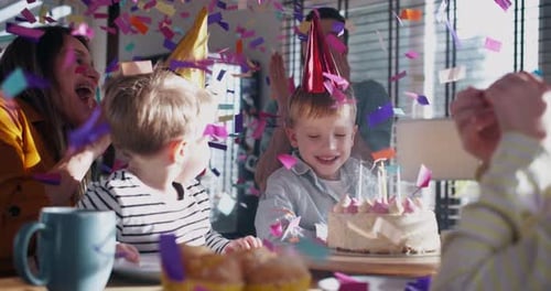 Happy Family Celebrating a Child's Birthday with Cake