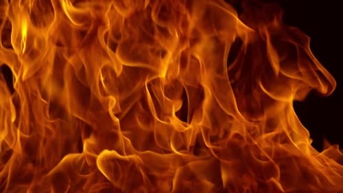 Flames of fire on black background in slow motion