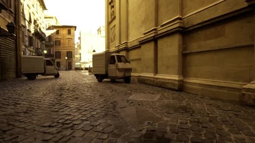 Casual City Logistics Captured in Tranquil Cobblestone Setting at Dusk