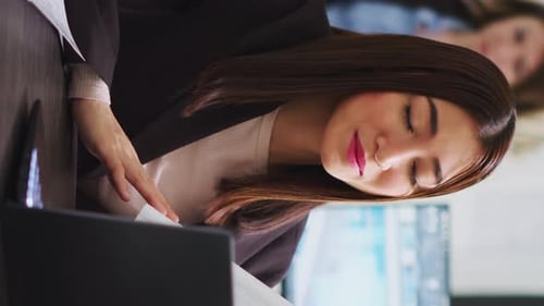 Vertical Video Engineer on Videocall with Technician to Ensure Suitable Design