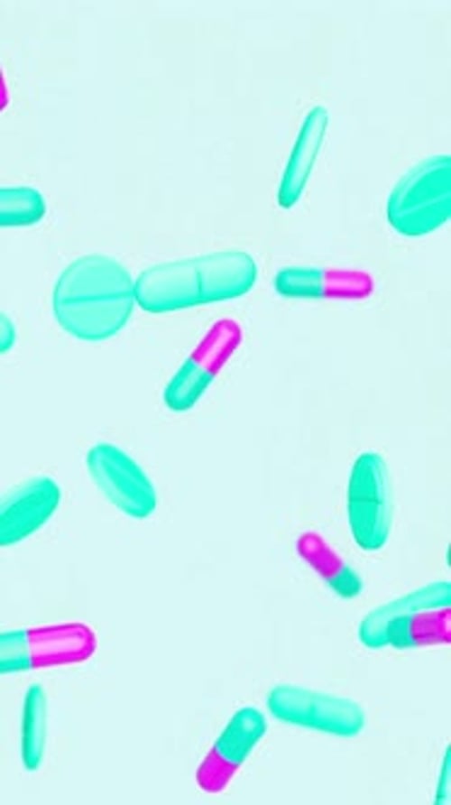 Animated Pills and Capsules Falling on a Light Blue Background
