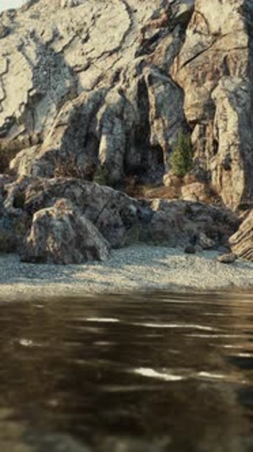 Majestic Rocky Mountain Overlooking a Serene Water Body