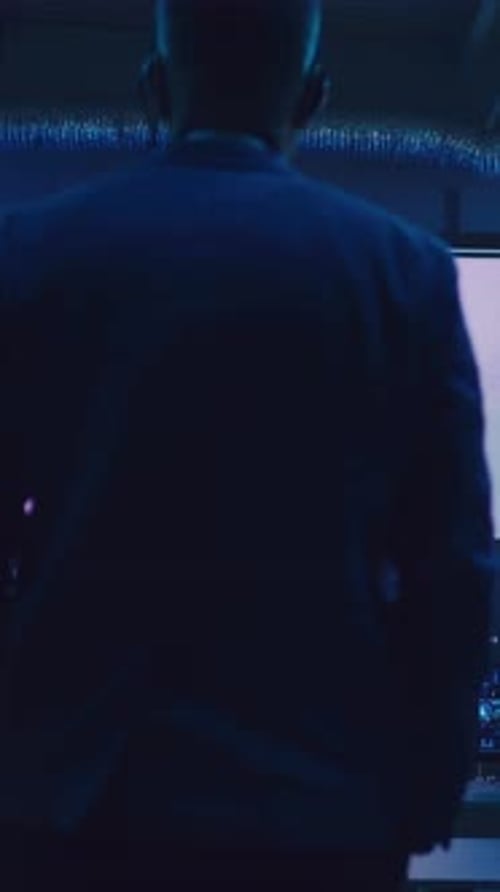 Boss Walking Towards Screen During Remote Rocket Launch