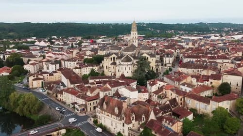 Wide view of the town of Périgeux and the river with the Cathedral Saint Front, drone shot with elev