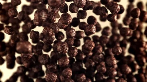 Chocolate Cereal Balls Floating in Mid-Air